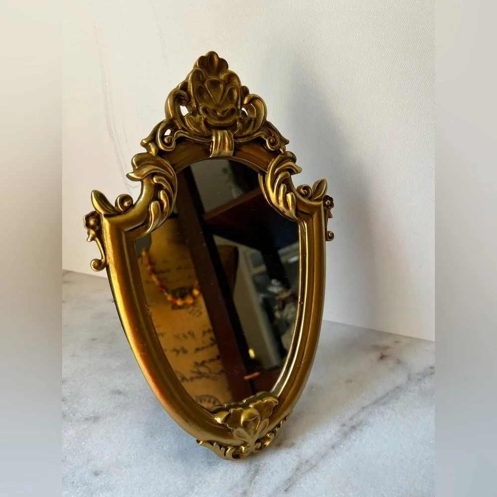 Ornate Gold and Black Decorative Mirror